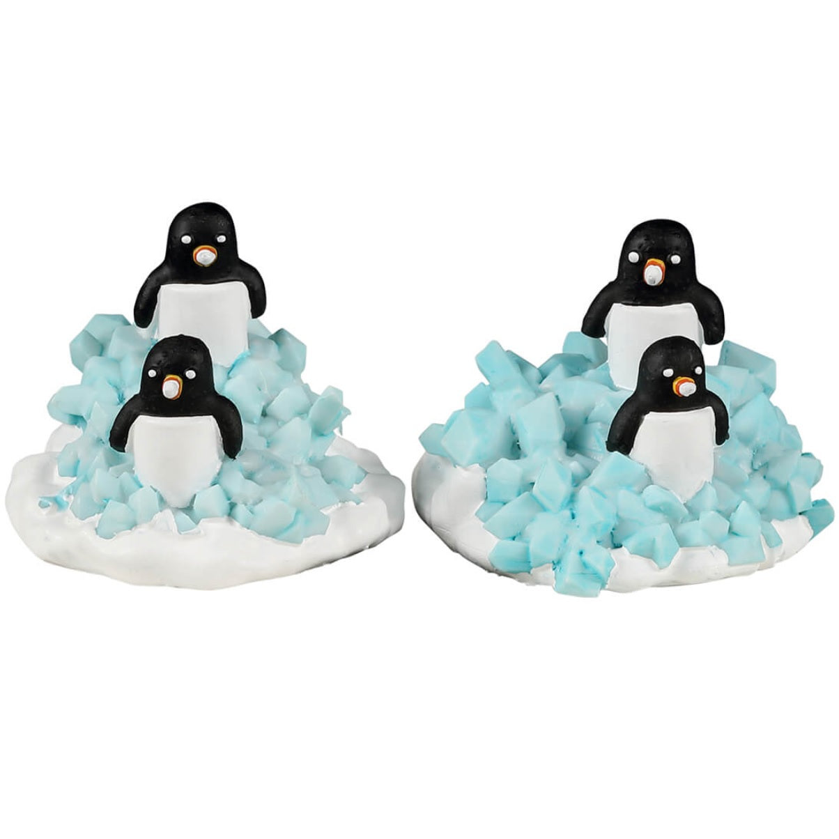 Resin figurines for a Lemax display. Designed to look like four penguins in blue rock candy and snow.