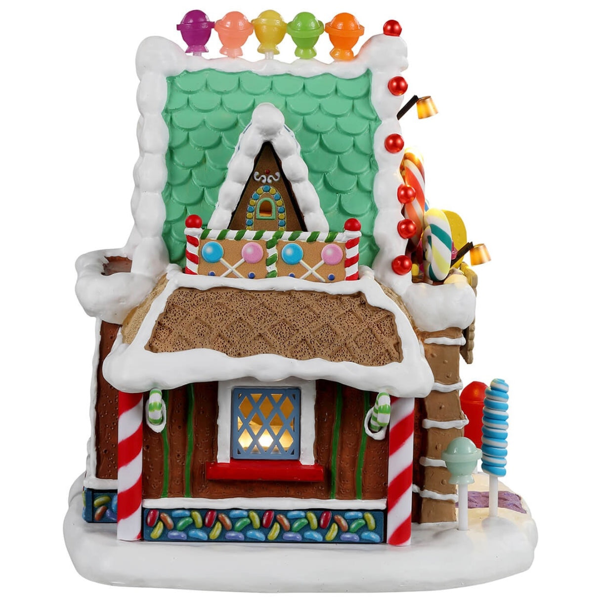 Resin lighted building for a Lemax display. Designed to look like a candy shop made out of gingerbread, candy, frosting and lollipops.
