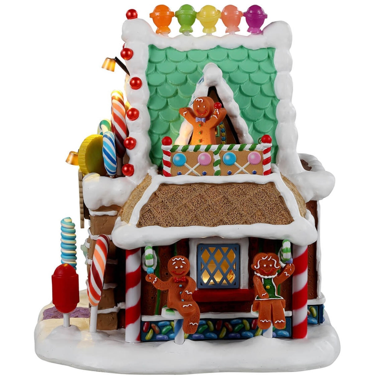 Resin lighted building for a Lemax display. Designed to look like a candy shop made out of gingerbread, candy, frosting and lollipops.