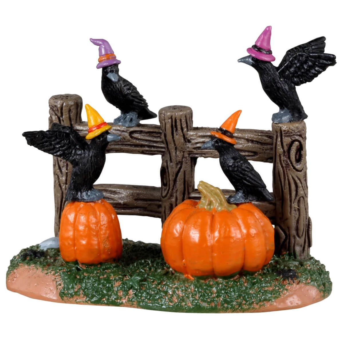 Resin village accent for a Lemax display. Designed to look like a wooden fence on a patch of grass. There are four crows wearing pointy hats and two pumpkins on the ground.