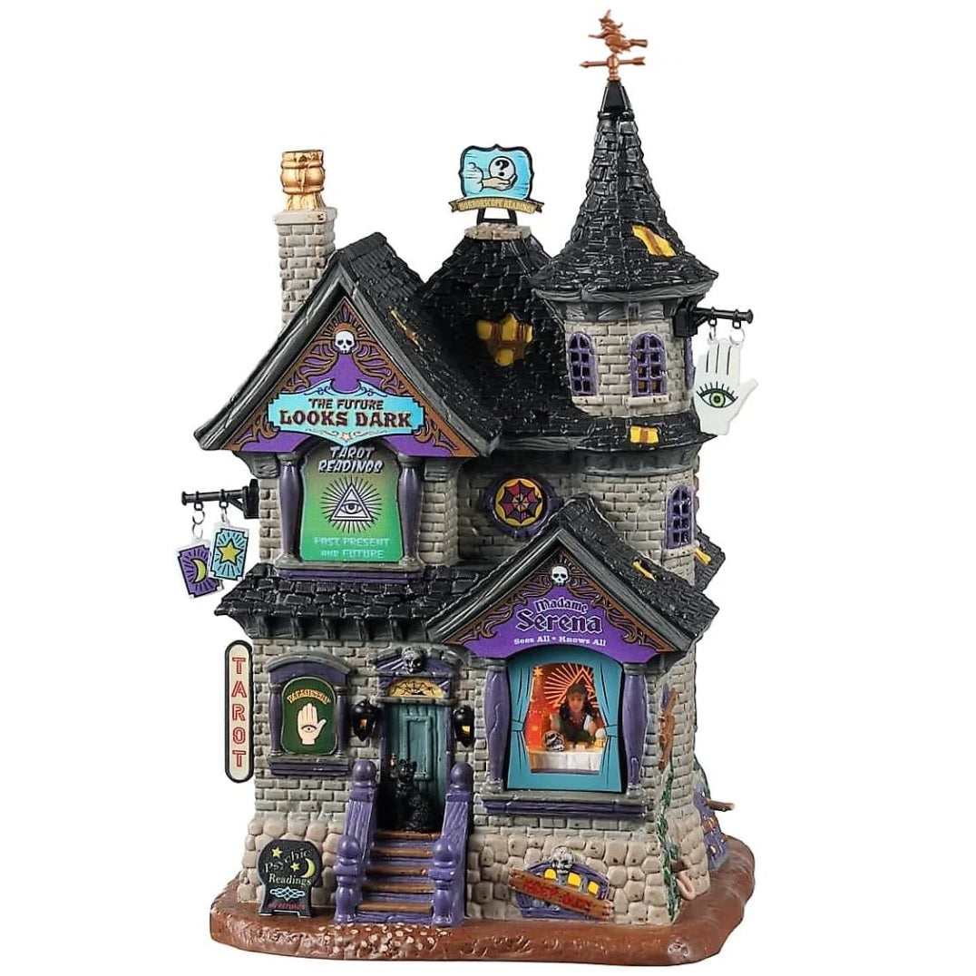 Porcelain lighted building for a Lemax display. Designed to look like a tall, brick building. Serena is staring out the window. There's a sign on the side that reads "TAROT."