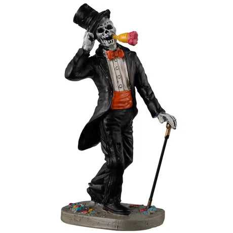 Resin figurine for a Lemax Spooky Town display. Designed to look like a skeleton wearing a tuxedo and a top hat. He has a red bowtie, a red cummerbund and is using a black and gold cane. He has a flower in his mouth.