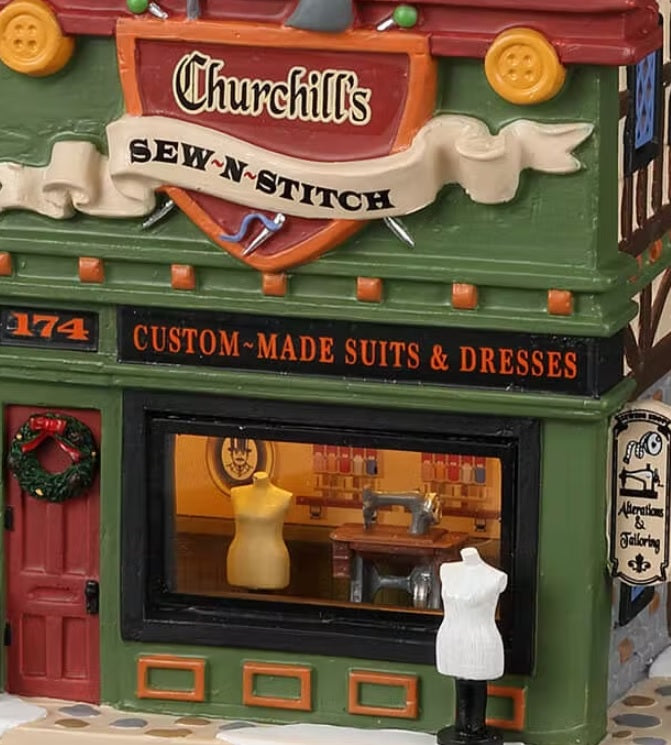 Lemax Caddington Village Lighted Building: Churchill’s Sew-N-Stitch #25900