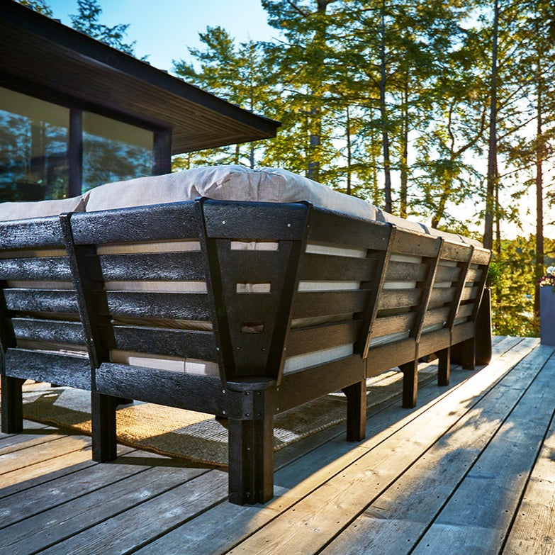 A close up view of the back of the sectional couch frame