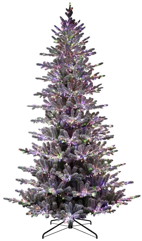 Artificial tree pre-lit with Starry lights. Branches are covered in white to appear covered in snow.