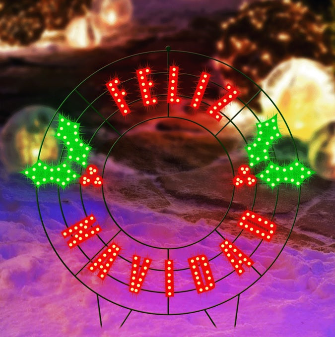 LED outdoor decoration that reads "Feliz Navidad." It features green holly leaves and red berries.
