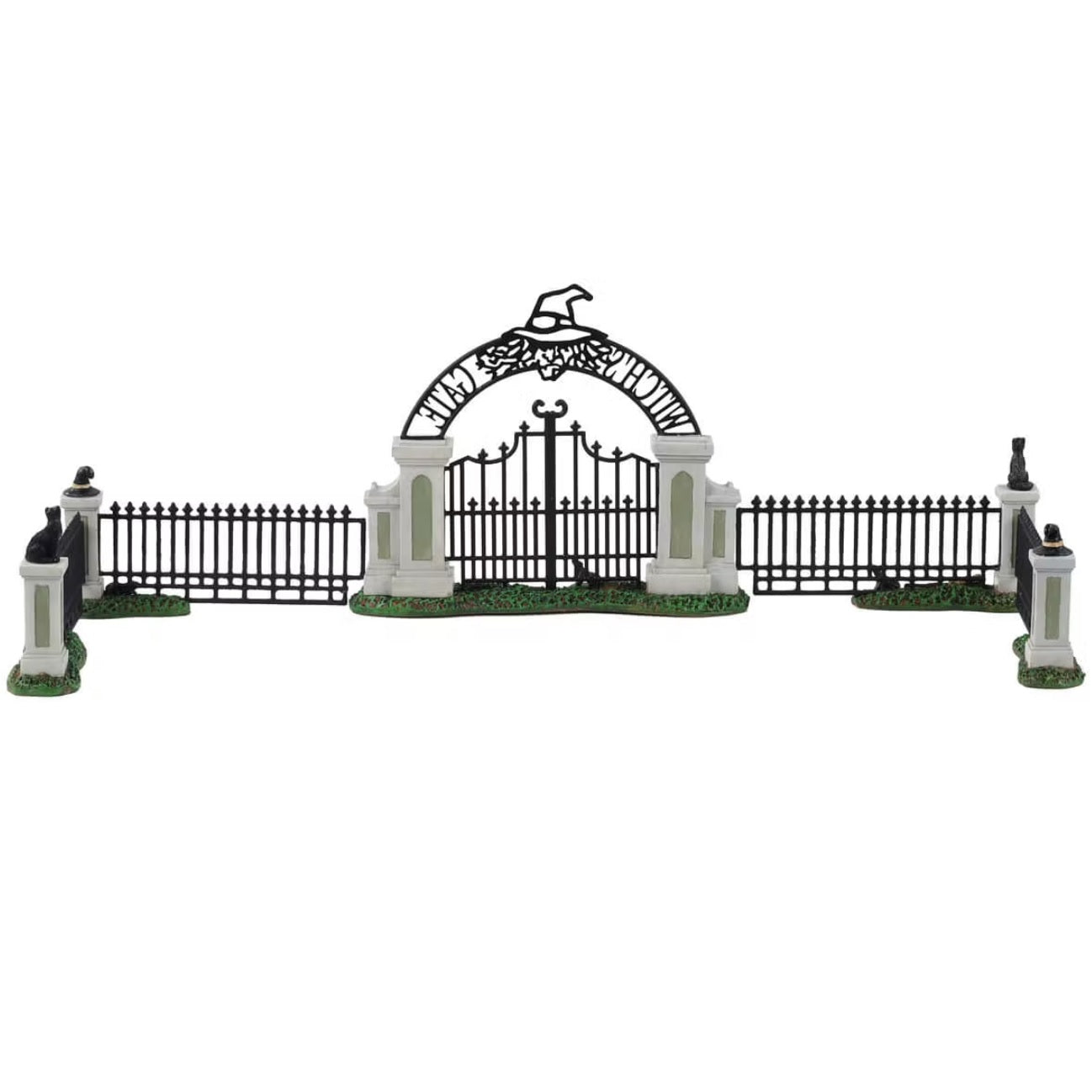 Polyresin village accessory for a Lemax display. Designed to look like an iron fence on patches of grass. There are four columns with witch hat and black cat statues on top. The gate reads "Witch's Gate" and there's a broom leaning against it.