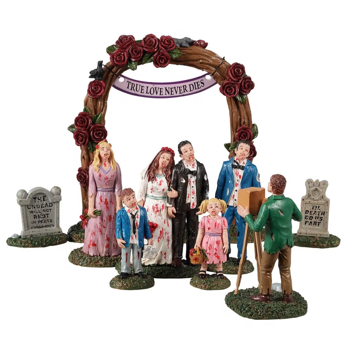 Resin figurines for a Lemax display. Designed to look like a zombie family getting their picture taken underneath a wooden arch with roses all over it. There's a bride, a groom, a maid of honor, a best man, a young boy and a young girl.