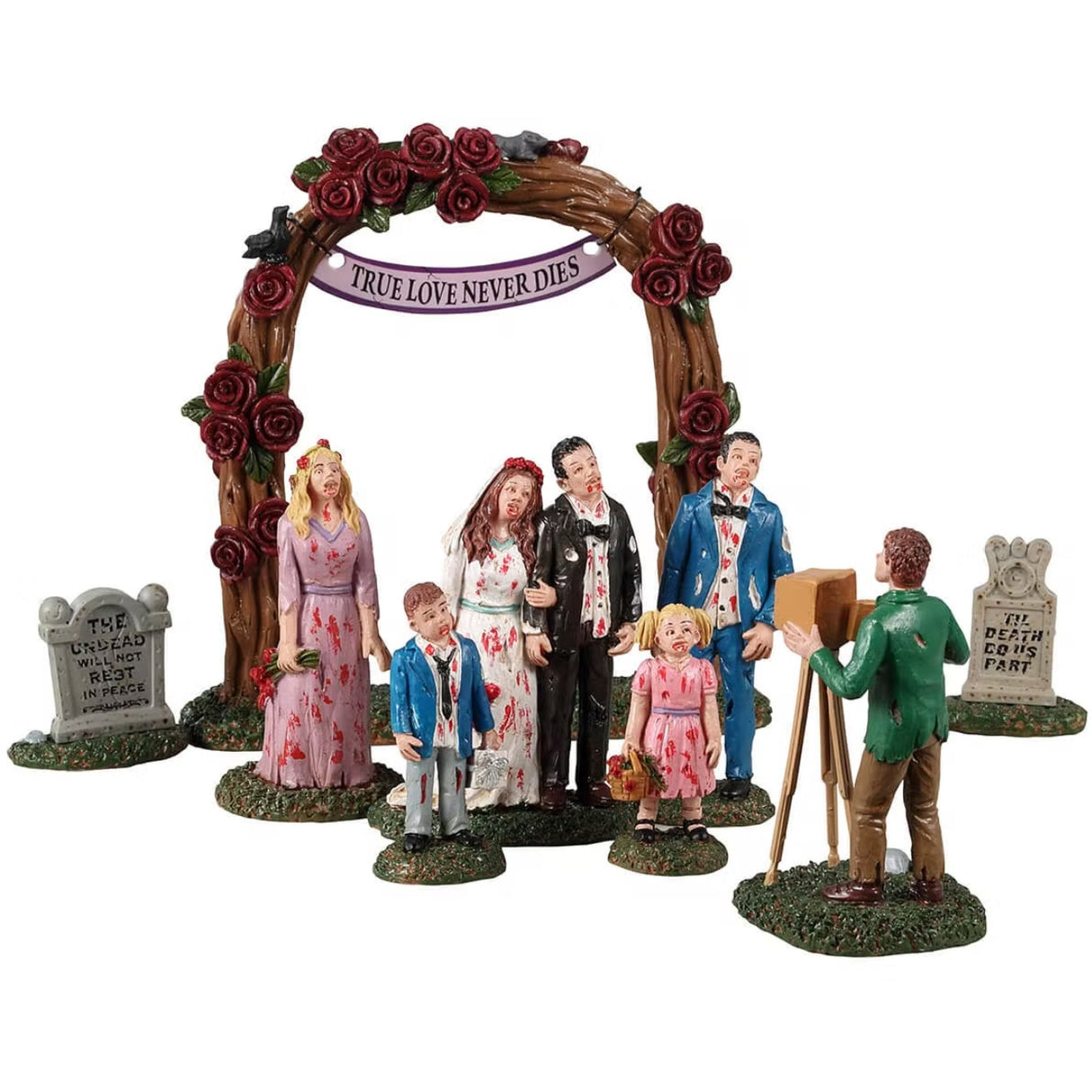 Resin figurines for a Lemax display. Designed to look like a zombie family getting their picture taken underneath a wooden arch with roses all over it. There's a bride, a groom, a maid of honor, a best man, a young boy and a young girl.