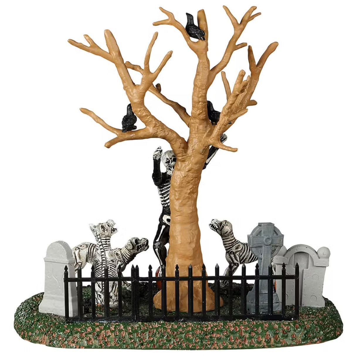 Resin village accent for a Lemax display. Designed to look like a skeleton dancing in a graveyard. There are tombstones and carved pumpkins on the grass. There's also a bare tree with crows on the branches. There are also skeleton dogs.