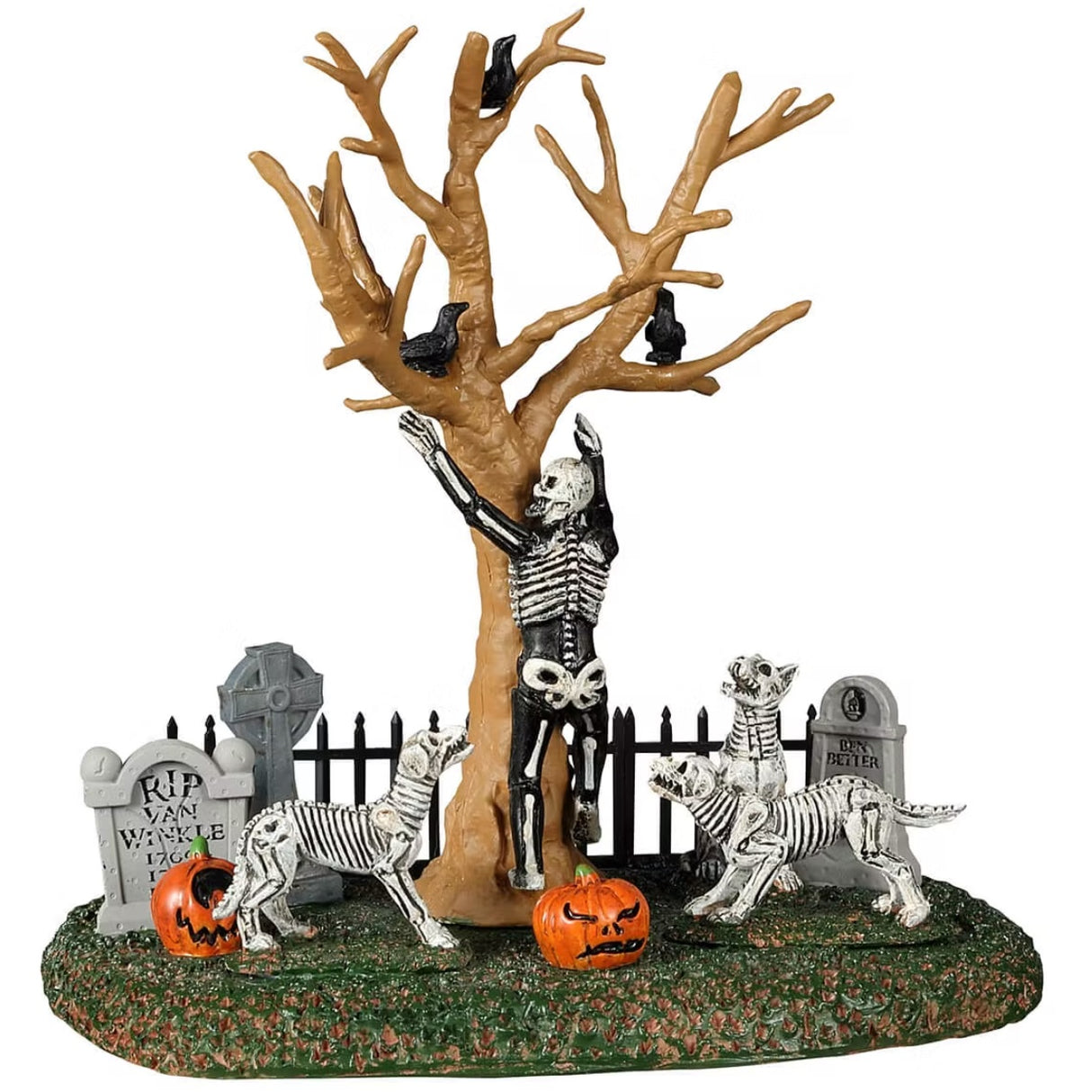 Resin village accent for a Lemax display. Designed to look like a skeleton dancing in a graveyard. There are tombstones and carved pumpkins on the grass. There's also a bare tree with crows on the branches. There are also skeleton dogs.