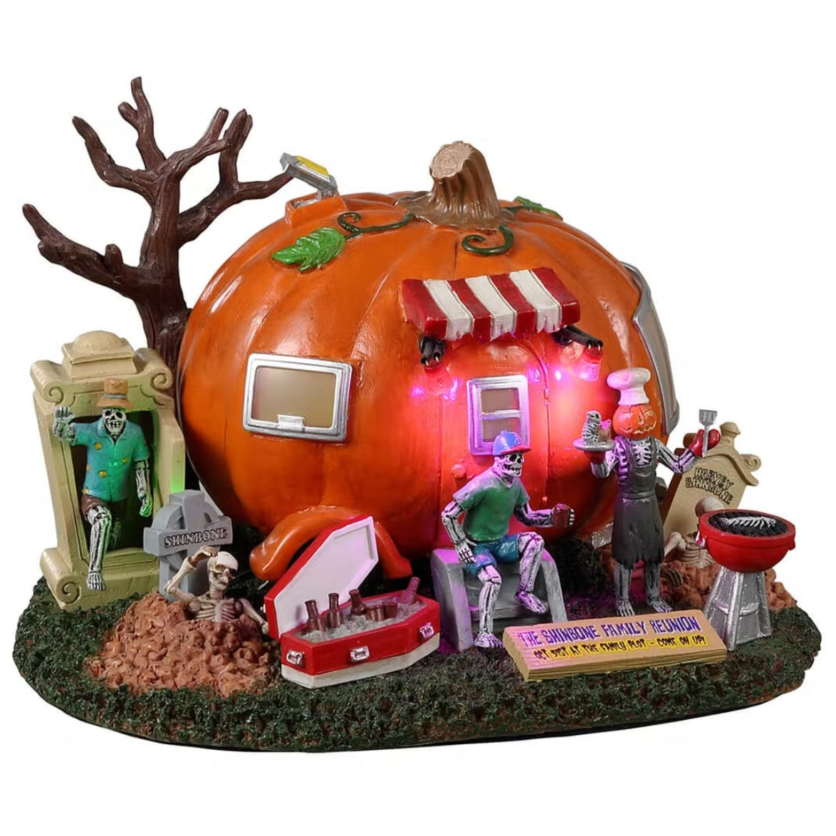 Resin lighted building for a Lemax display. Designed to look like a camper made out of a large pumpkin. There are skeletons enjoying a BBQ.