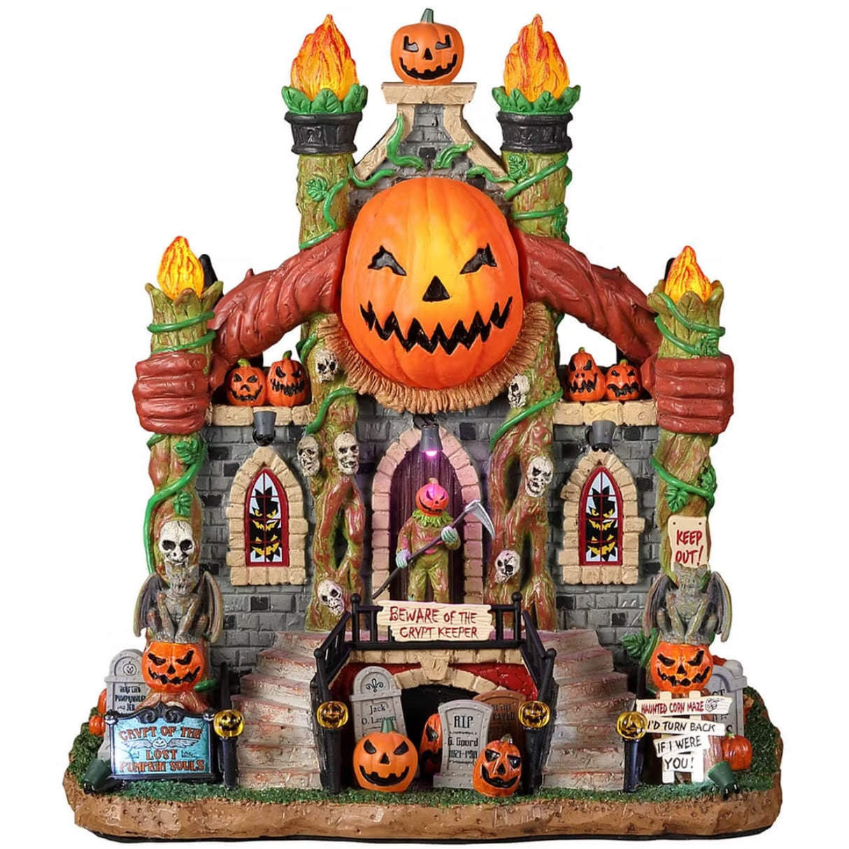 Resin building for a Lemax display. Designed to look like a crypt decorated with carved pumpkins, skulls, flames, vines, tombstones and broken windows.