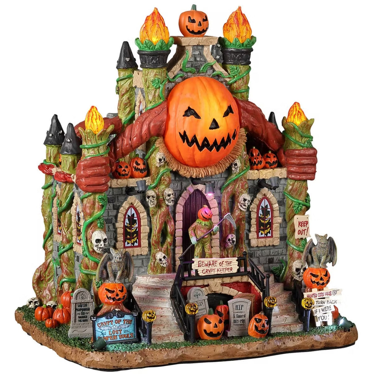 Resin building for a Lemax display. Designed to look like a crypt decorated with carved pumpkins, skulls, flames, vines, tombstones and broken windows.
