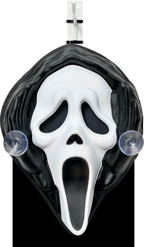 Decoration designed to be hung in your window or on a glass door. Looks like Ghost Face is peeping into your home, or peering out.