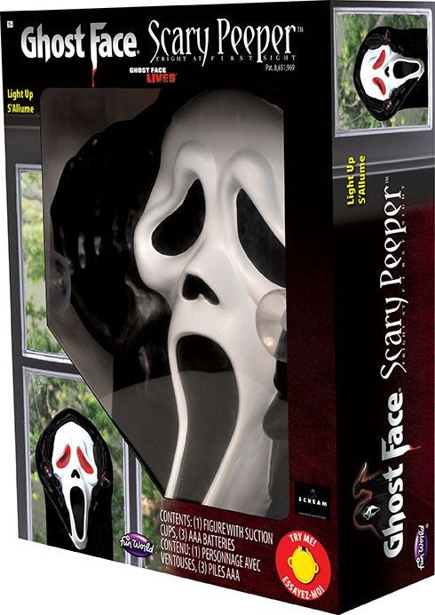 Decoration designed to be hung in your window or on a glass door. Looks like Ghost Face is peeping into your home, or peering out.