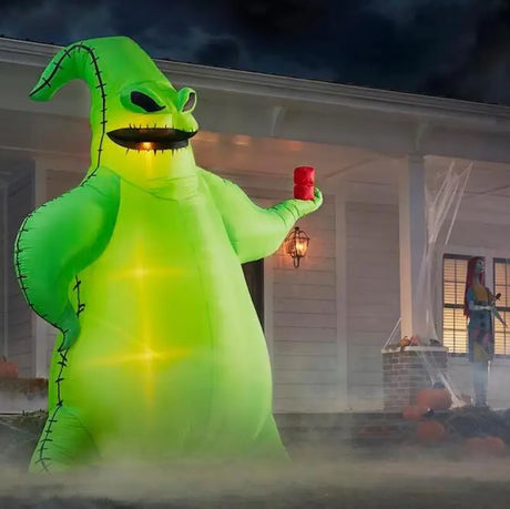 Halloween inflatable designed to look like Oogie Boogie, the villainous bag of bugs from the movie The Nightmare Before Christmas. His burlap sack glows neon green and he's holding some red dice.