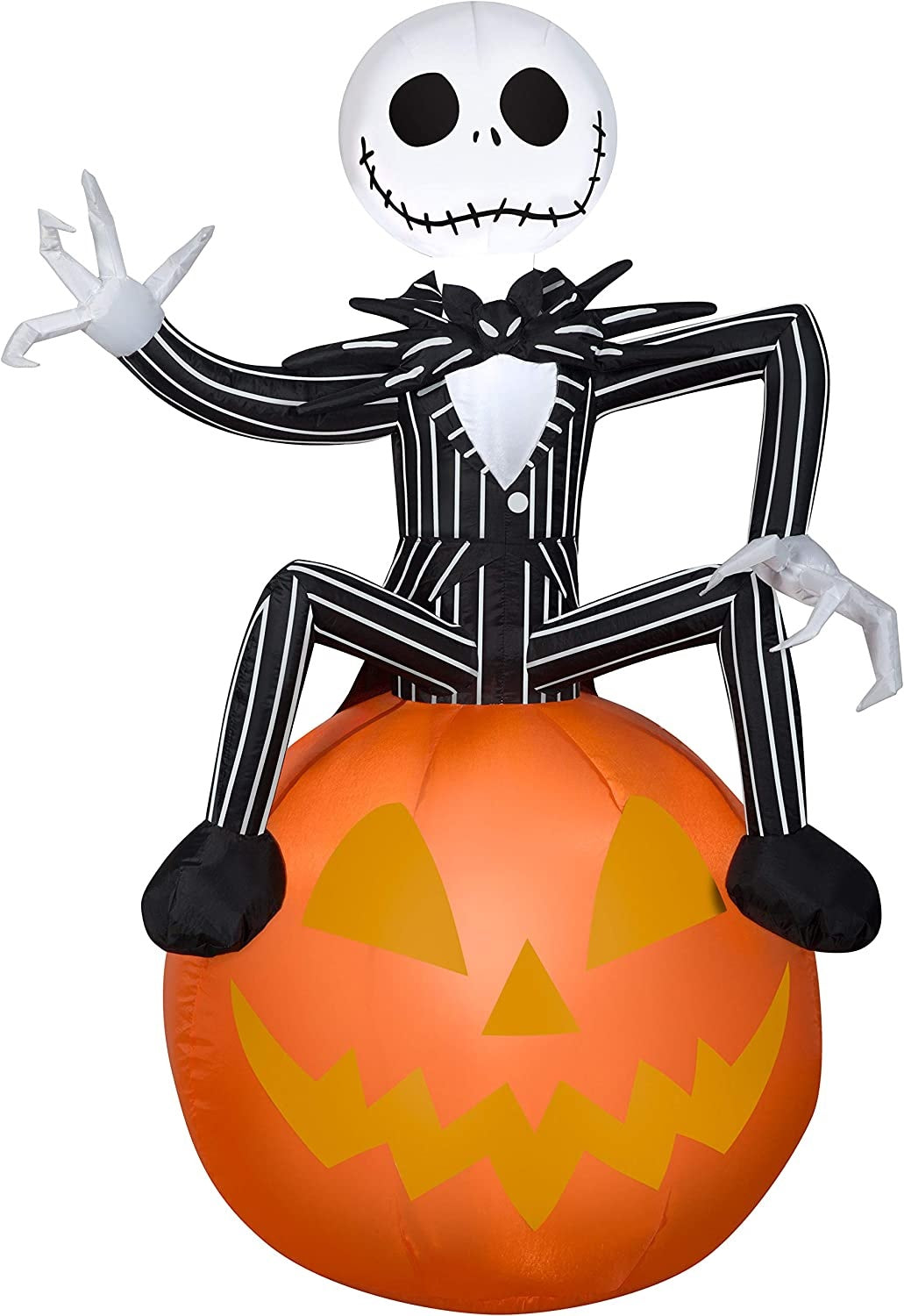 Halloween inflatable shaped like Jack Skellington from the movie The Nightmare Before Christmas. He's sitting on a jack-o-lantern and waving.