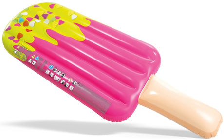 Inflatable pool float shaped like a pink popsicle. The tip of the popsicle looks like it's dipped in yellow frosting with heart shaped sprinkles on it.