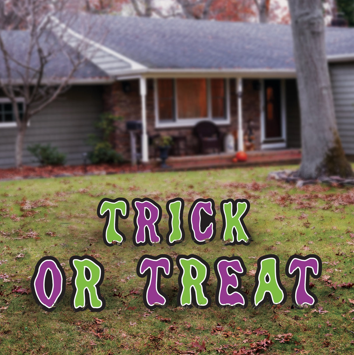Halloween banner decoration. There are two options. One reads "Trick or Treat" in purple and green letters. The other reads "Happy Halloween" in orange letters with black borders.