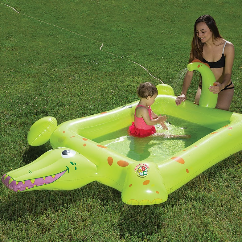Inflatable pool for kids shaped like a square crocodile.