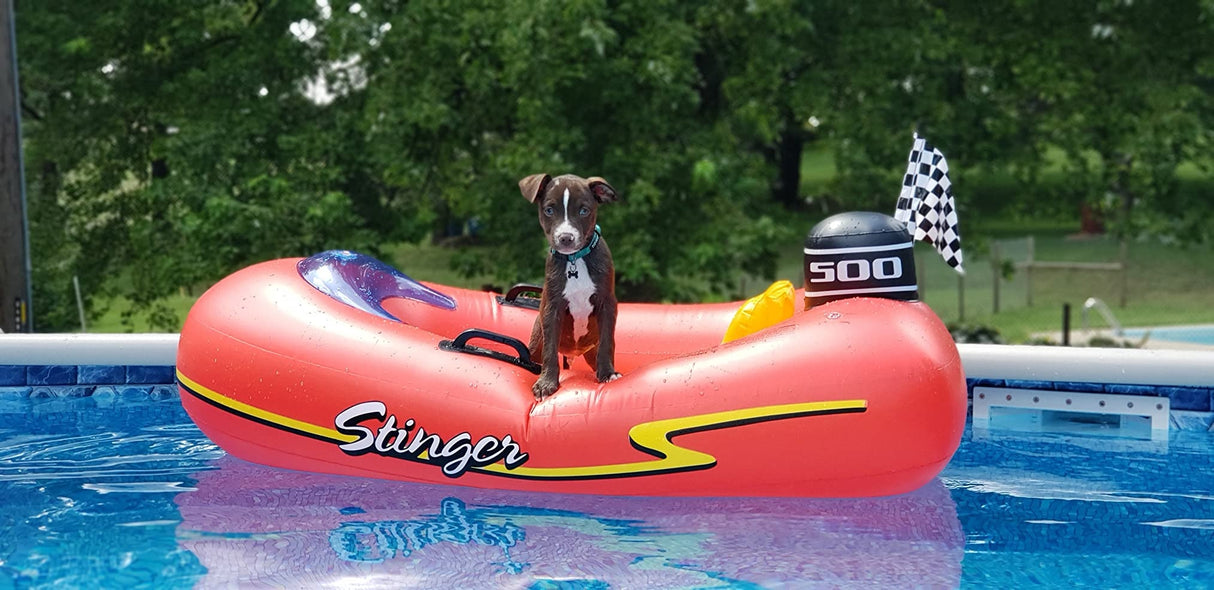 Pool float for kids shaped like a red speedboat.