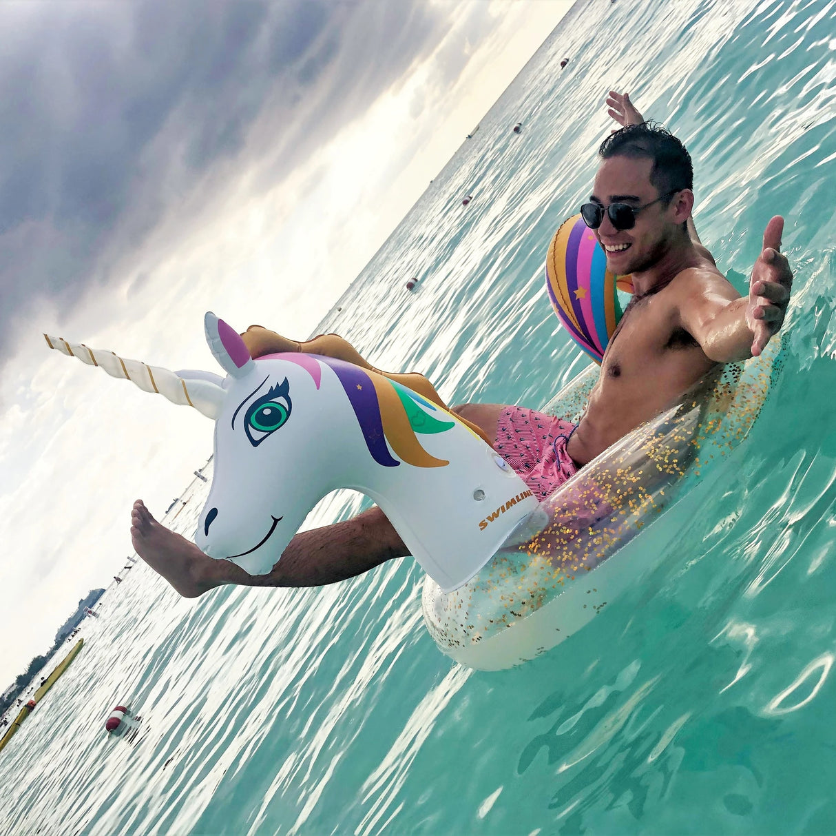 Swimline LED Light Up Inflatable Glitter Unicorn Ring