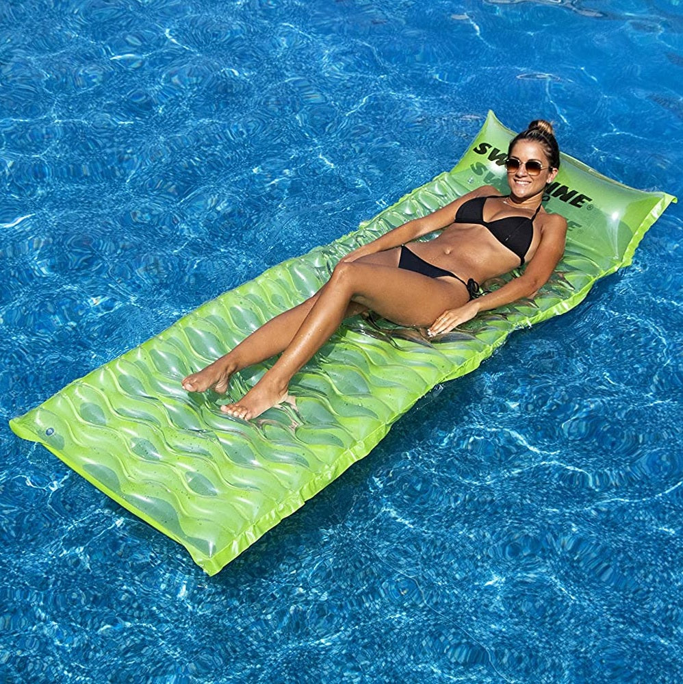 Inflatable pool mattresses. There are three color options: yellow, pink or lime green.