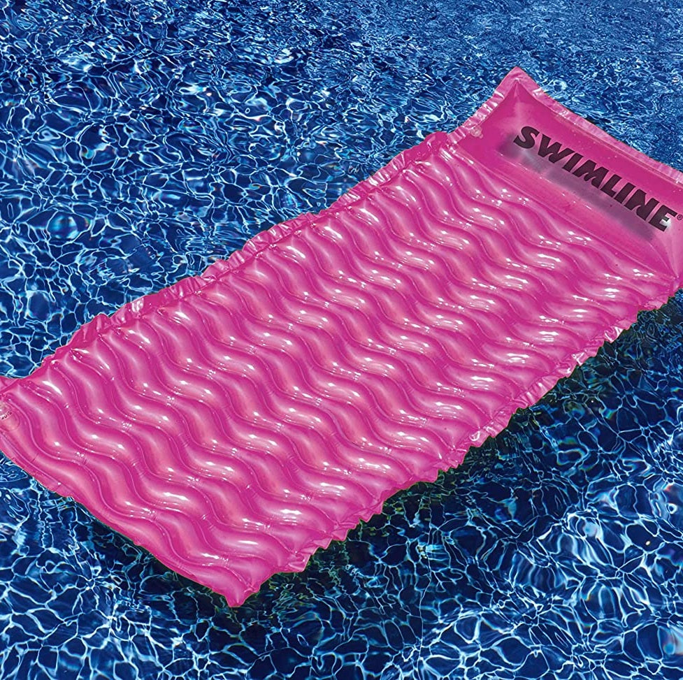 Inflatable pool mattresses. There are three color options: yellow, pink or lime green.