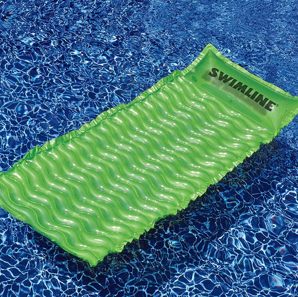 Inflatable pool mattresses. There are three color options: yellow, pink or lime green.
