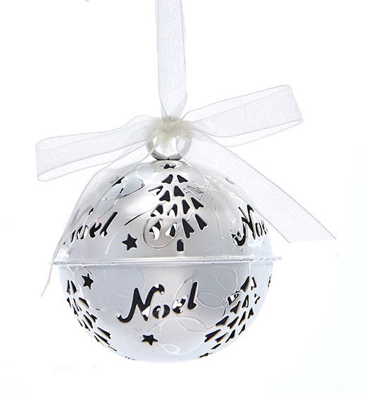 Silver bell ornament with tree and star cutouts and cutouts that read "NOEL."