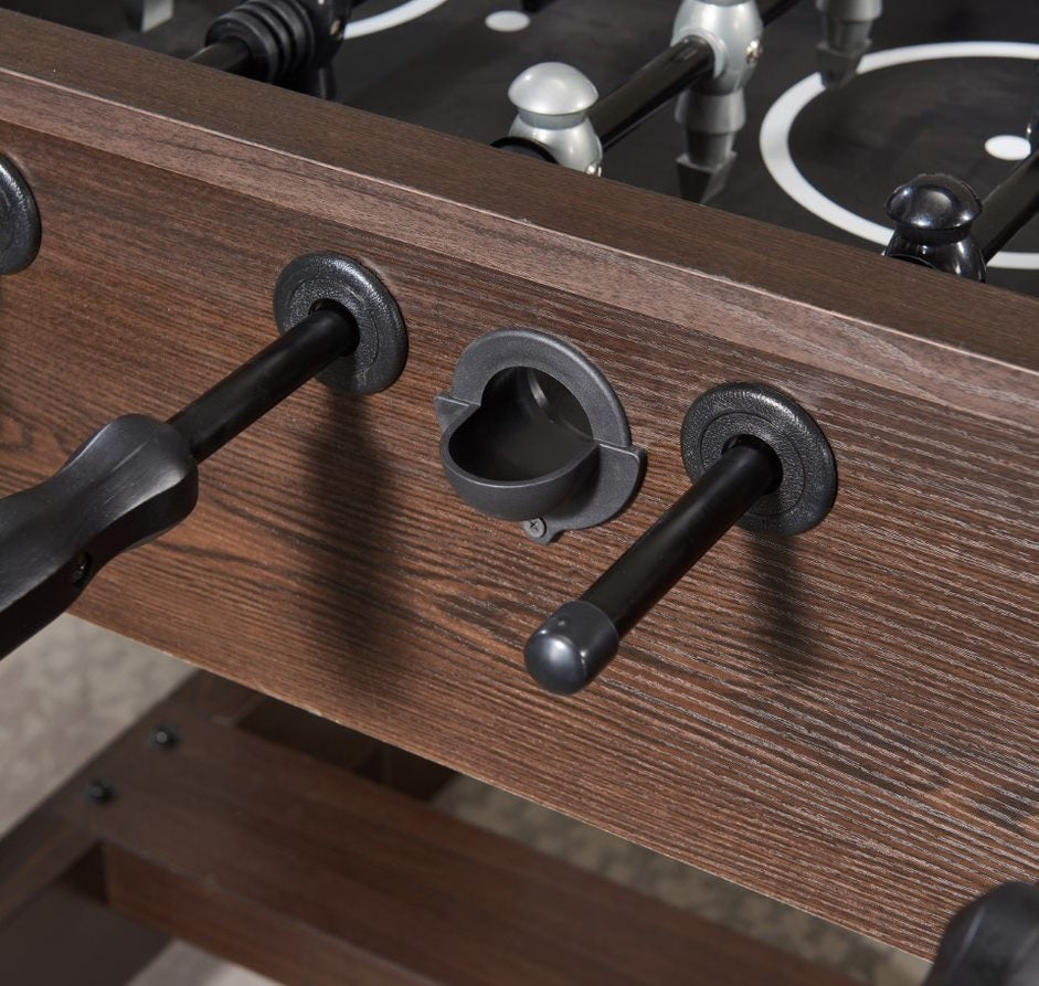 Close up of the ball entrance for the foosball table.