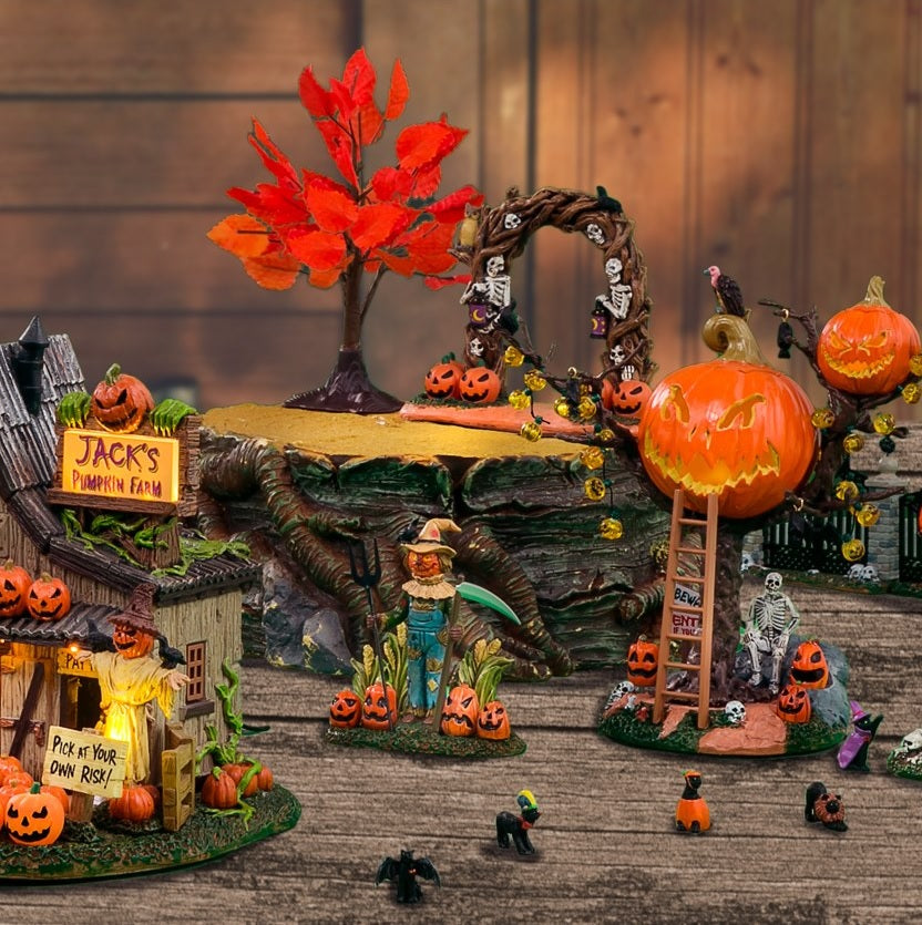 Polyresin village accent for a Lemax display. Designed to look like a treehouse made out of carved pumpkins. There are pumpkin lights, bats and black crows hanging from the branches. There's a vulture on the roof and a ladder leaning against the tree. There's a skeleton sitting underneath the treehouse among skulls, pumpkins and signs reading "BEWARE!" and "ENTER IF YOU DARE!"