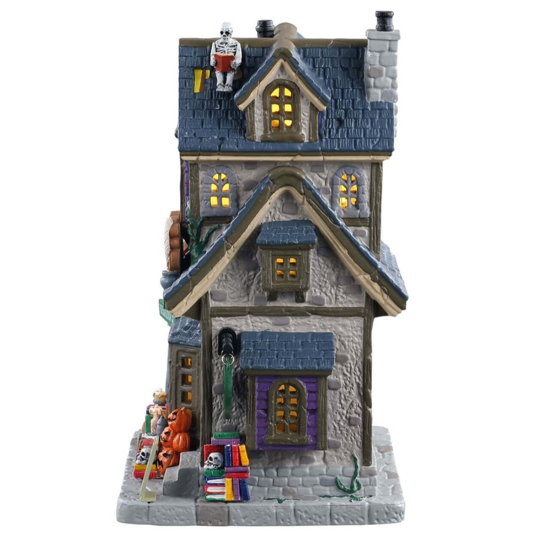 Porcelain lighted building for a Lemax display. Designed to look like a house that's been turned into a bookstore. There are skeletons reading, a Grim Reaper on the sidewalk and a shelf of books for sale outside.