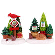 Polyresin figures for a Lemax Village display. One figure features an arrow and it reads "Tree Farm." There are three different potted trees behind the sign and a red bird on top of the sign. There's also a squirrel standing in the snow looking at an acorn. The other figure shows three more potted trees with a squirrel and a baby deer resting nearby. One tree has a sign on it that reads "Best for Trimming" and another one has a sign that reads "Grows to 10 ft."