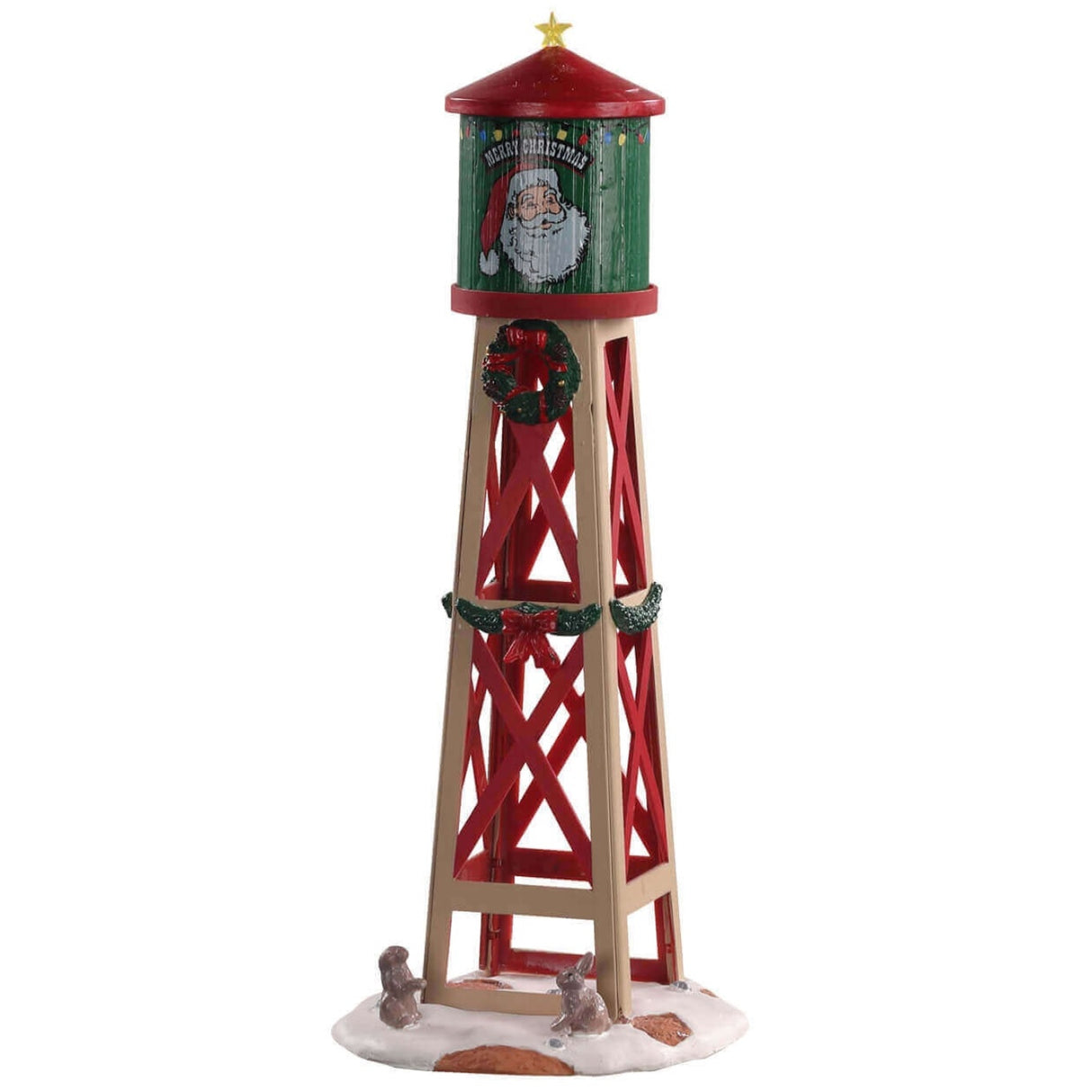 Polyresin figurine for a Lemax Village tabletop display. Designed to look like a red, green and brown water tower. The water tower features Santa's face, a yellow star on the top, a wreath and garland. There are two bunnies in the snow at the bottom