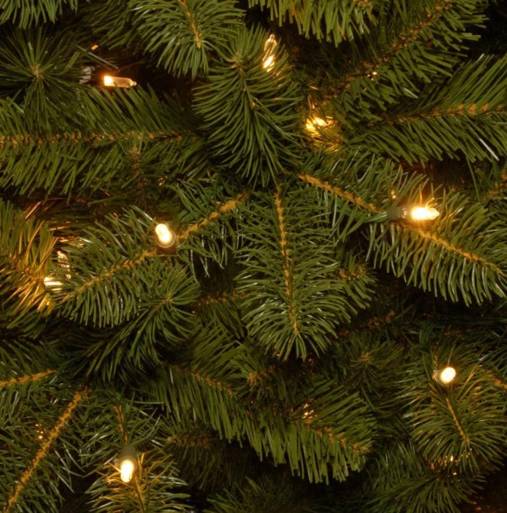 Artificial tree pre-lit with dual lights. Lights change from warm white to multi-colored.