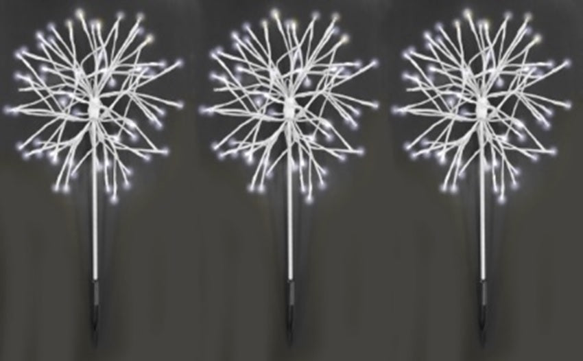 Three pure white LED snowburst decorations.