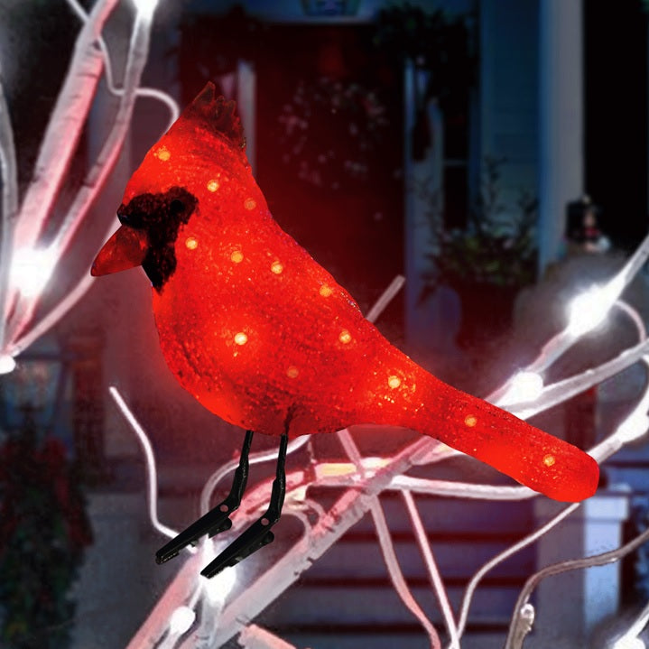 A red clip-on LED ornament.