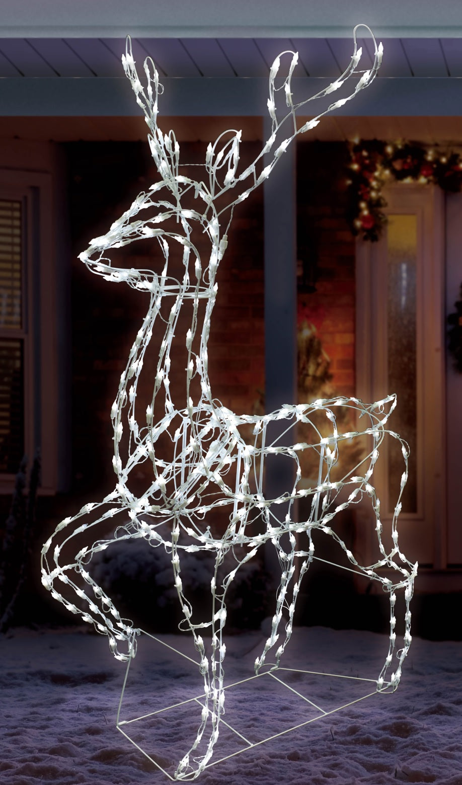 LED winter decoration pre-lit with pure white lights. Wire is shaped to look like a standing deer.