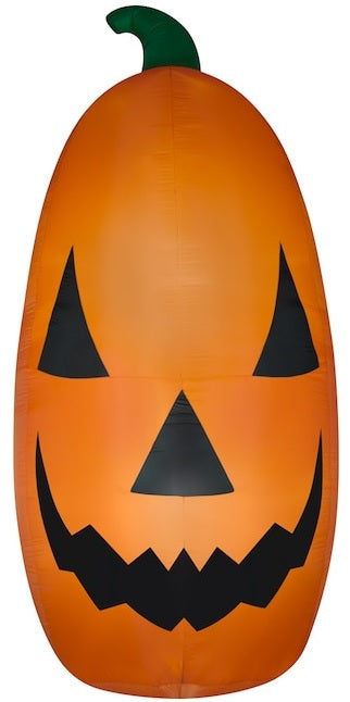 Very large, very bright inflatable shaped like a jack-o-lantern.