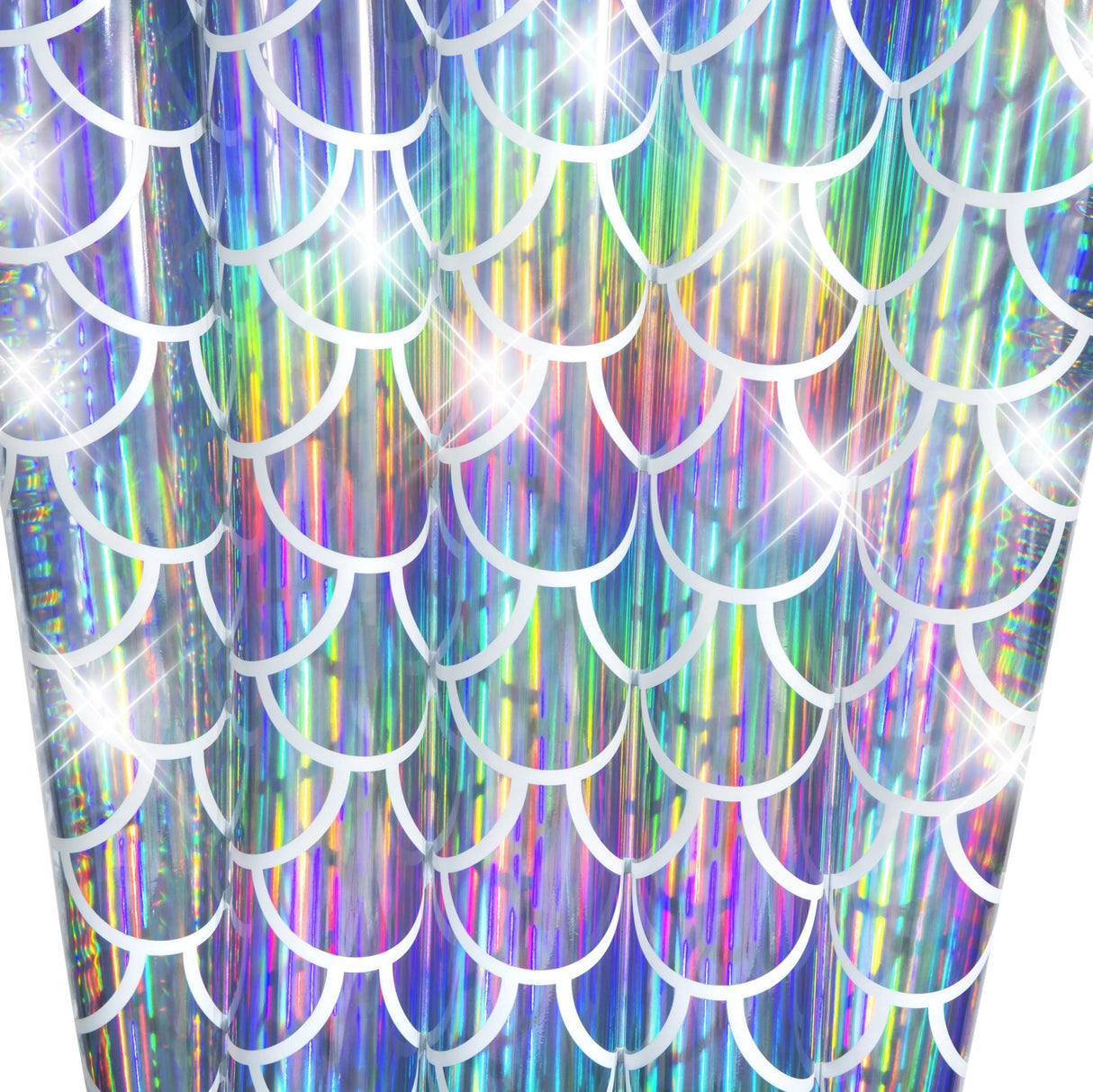 Silver, holographic pool float shaped like a mermaid's tail.