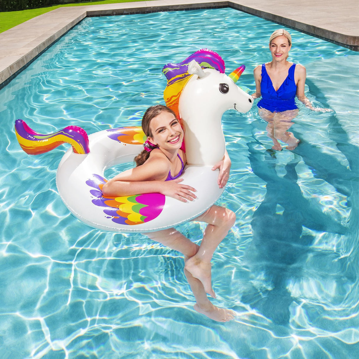 Inner tube for kids shaped like a rainbow, unicorn.