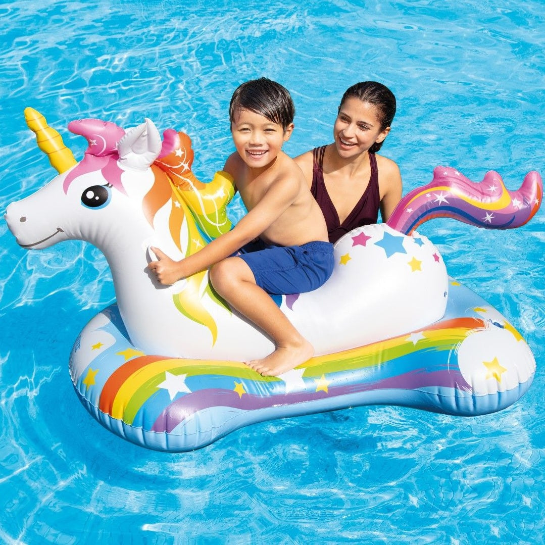 An inflatable pool float designed to look like a rainbow unicorn.