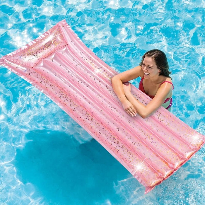 Pink and glittery inflatable pool mattress.
