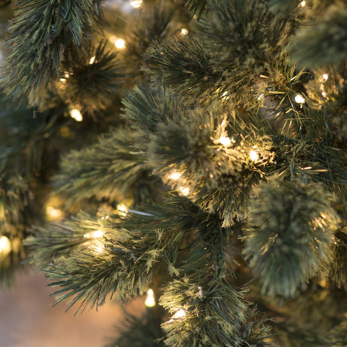 Pre-lit artificial tree. Lights are clear.