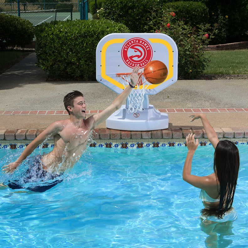 Pool basketball hoop with a Atlanta Hawks logo on it.