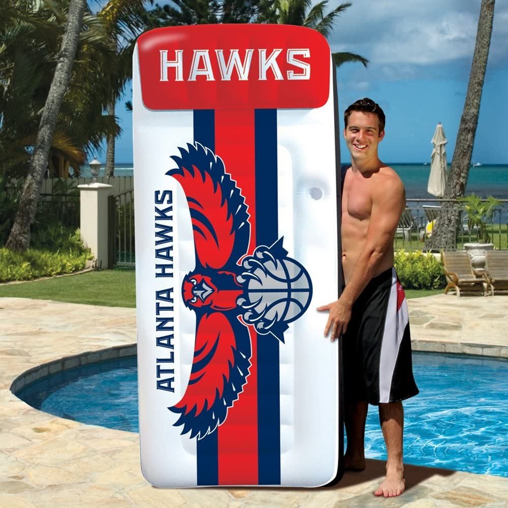 Pool mattress with Atlanta Hawks logos on it.