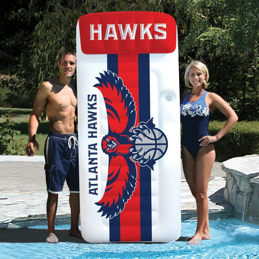 Pool mattress with Atlanta Hawks logos on it.