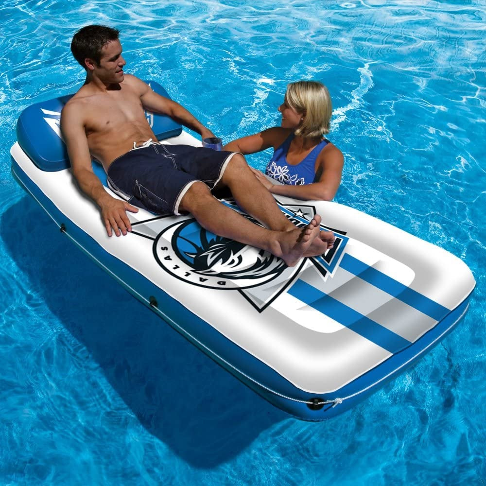 Pool mattress with Dallas Mavericks logos on it.